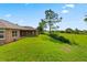 Large grassy backyard with plenty of space at 32202 Summerglade Dr, Wesley Chapel, FL 33545