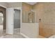 Bathroom with shower and access to walk-in closet at 32202 Summerglade Dr, Wesley Chapel, FL 33545