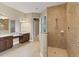 Large bathroom with double vanity and shower at 32202 Summerglade Dr, Wesley Chapel, FL 33545
