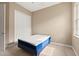 Bright bedroom with double bed and closet at 32202 Summerglade Dr, Wesley Chapel, FL 33545