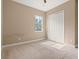 Well-lit bedroom featuring a double door closet at 32202 Summerglade Dr, Wesley Chapel, FL 33545