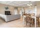 Combined living and dining space with large windows and natural light at 32202 Summerglade Dr, Wesley Chapel, FL 33545