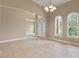 Bright dining room with tile floors and access to other rooms at 32202 Summerglade Dr, Wesley Chapel, FL 33545