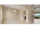 Open dining area, view of kitchen and living room at 32202 Summerglade Dr, Wesley Chapel, FL 33545