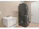 Laundry room with stackable washer and dryer at 32202 Summerglade Dr, Wesley Chapel, FL 33545