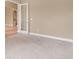 Simple office space with neutral carpeting and white door at 32202 Summerglade Dr, Wesley Chapel, FL 33545