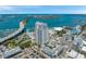 Aerial view of waterfront high-rise building with pool and marina at 331 Cleveland St # 315, Clearwater, FL 33755