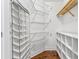 Well-organized closet featuring wire shelving and a shoe rack at 331 Cleveland St # 315, Clearwater, FL 33755