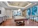 Elegant game room boasts a pool table, hardwood floors, and ample space for entertainment at 331 Cleveland St # 315, Clearwater, FL 33755