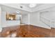 Open concept living room and kitchen with hardwood floors at 331 Cleveland St # 315, Clearwater, FL 33755