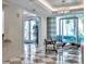 Elegant building lobby with seating area and water feature at 331 Cleveland St # 315, Clearwater, FL 33755