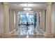 Elegant lobby with marble floors and a seating area at 331 Cleveland St # 315, Clearwater, FL 33755