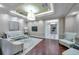 Comfortable lounge area features plush seating and a glass-top coffee table at 331 Cleveland St # 315, Clearwater, FL 33755