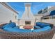 Outdoor fireplace and seating area; perfect for gatherings at 331 Cleveland St # 315, Clearwater, FL 33755