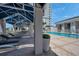 Relaxing pool area with covered seating and lounge chairs at 331 Cleveland St # 315, Clearwater, FL 33755
