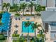 Upscale community pool with patio and tropical landscaping at 331 Cleveland St # 315, Clearwater, FL 33755