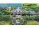 Community clubhouse and surrounding landscape at 5610 Golden Isles Dr, Apollo Beach, FL 33572