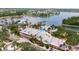 Community clubhouse with adjacent pool and lake views at 5610 Golden Isles Dr, Apollo Beach, FL 33572