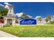 MiraBay community entrance with signage and lush landscaping at 5610 Golden Isles Dr, Apollo Beach, FL 33572