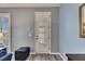 White interior door with louvered shutters leading outside at 5610 Golden Isles Dr, Apollo Beach, FL 33572