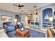Spacious living room with comfy seating and built-in shelving at 5610 Golden Isles Dr, Apollo Beach, FL 33572