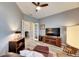 Relaxing living room featuring a ceiling fan and comfortable seating at 5610 Golden Isles Dr, Apollo Beach, FL 33572