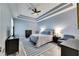Spacious main bedroom with ceiling fan and large windows at 5610 Golden Isles Dr, Apollo Beach, FL 33572