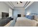 Main bedroom featuring a comfortable bed and ample dresser space at 5610 Golden Isles Dr, Apollo Beach, FL 33572