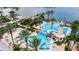 Resort-style pool area with lap pool, water slide, and lounge chairs at 5610 Golden Isles Dr, Apollo Beach, FL 33572