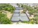 Well-maintained tennis courts in a community setting at 5610 Golden Isles Dr, Apollo Beach, FL 33572