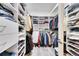 Spacious walk-in closet with ample shelving and hanging space at 5610 Golden Isles Dr, Apollo Beach, FL 33572