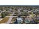 Aerial view showing house, pool, and surrounding neighborhood at 6008 49Th N Ave, Kenneth City, FL 33709