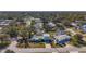 Aerial view of a house situated in a residential neighborhood at 6008 49Th N Ave, Kenneth City, FL 33709