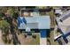 Overhead view of house, yard, and driveway at 6008 49Th N Ave, Kenneth City, FL 33709