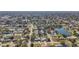 Aerial view showcasing a neighborhood's layout and homes at 6008 49Th N Ave, Kenneth City, FL 33709