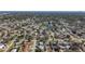 Wide aerial view of neighborhood, showing various houses and landscape at 6008 49Th N Ave, Kenneth City, FL 33709