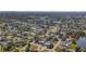 Aerial perspective of houses, roads, and a lake in a community at 6008 49Th N Ave, Kenneth City, FL 33709