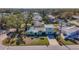 An aerial view of a house in a residential neighborhood at 6008 49Th N Ave, Kenneth City, FL 33709