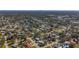 Aerial view of a residential area, showing various houses and streets at 6008 49Th N Ave, Kenneth City, FL 33709