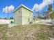 Large backyard with deck and fence at 6008 49Th N Ave, Kenneth City, FL 33709