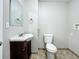 Clean bathroom with vanity, toilet, and tiled floor at 6008 49Th N Ave, Kenneth City, FL 33709