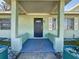 Dark brown front door with a glass window pane at 6008 49Th N Ave, Kenneth City, FL 33709