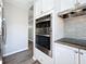 Updated kitchen with stainless steel appliances and granite countertops at 6008 49Th N Ave, Kenneth City, FL 33709