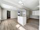 Updated kitchen, granite island, and white shaker cabinets at 6008 49Th N Ave, Kenneth City, FL 33709