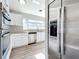 Modern kitchen with stainless steel appliances and granite at 6008 49Th N Ave, Kenneth City, FL 33709