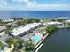 Aerial view of waterfront community with pool and bay view at 611 Destiny Dr # 216, Ruskin, FL 33570
