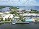 Aerial view of waterfront community with pool and marina at 611 Destiny Dr # 216, Ruskin, FL 33570