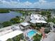 Community pool and surrounding buildings from an aerial perspective at 611 Destiny Dr # 216, Ruskin, FL 33570