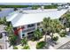 Building's exterior with metal roof and waterfront location at 611 Destiny Dr # 216, Ruskin, FL 33570