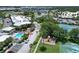 Aerial view of community amenities including pool, tennis courts, and playground at 611 Destiny Dr # 216, Ruskin, FL 33570